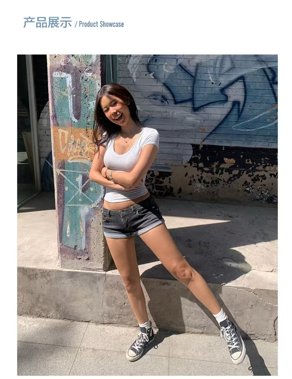Lifestyle shot – white crop top styled with denim shorts and Converse sneakers