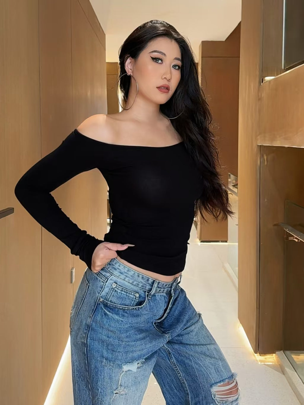 White off-shoulder top – side profile view showing cropped waist