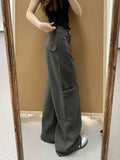 Dark grey cargo wide-leg jeans – side view showing large cargo pocket