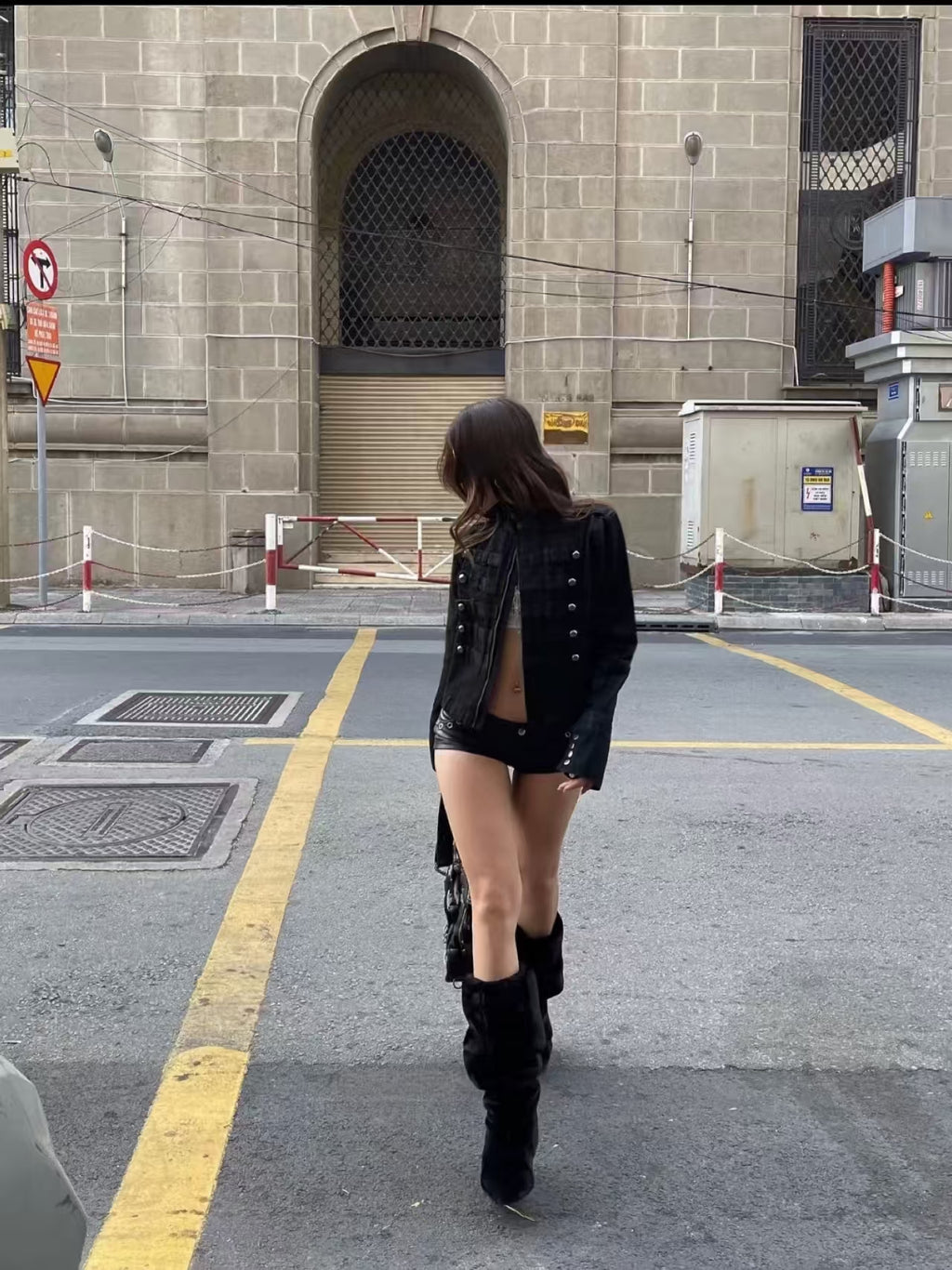 White denim jacket – mirror selfie full outfit view with black shorts and knee boots