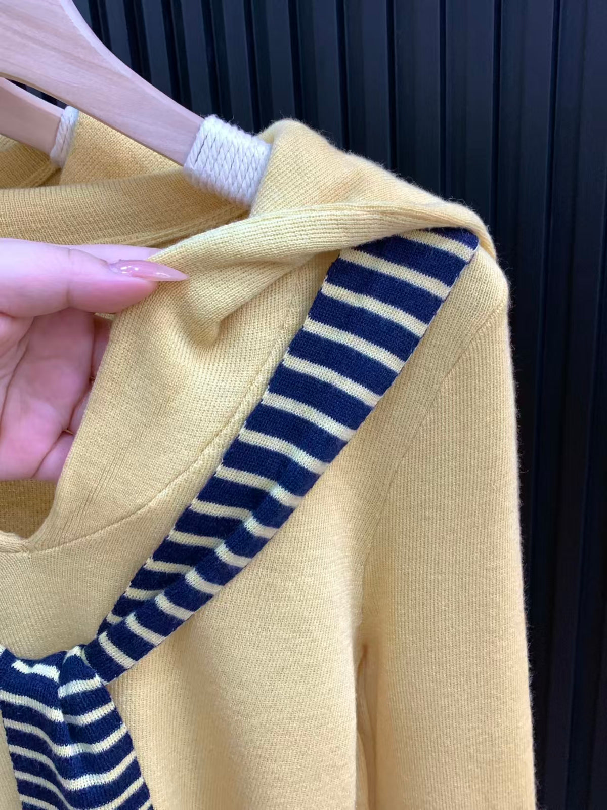 Yellow knit top - close-up of striped navy blue and cream sailor collar shawl detail