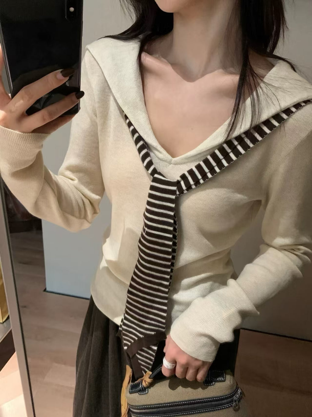 Cream beige fake two-piece sailor collar knit top - mirror selfie close-up with striped tie detail