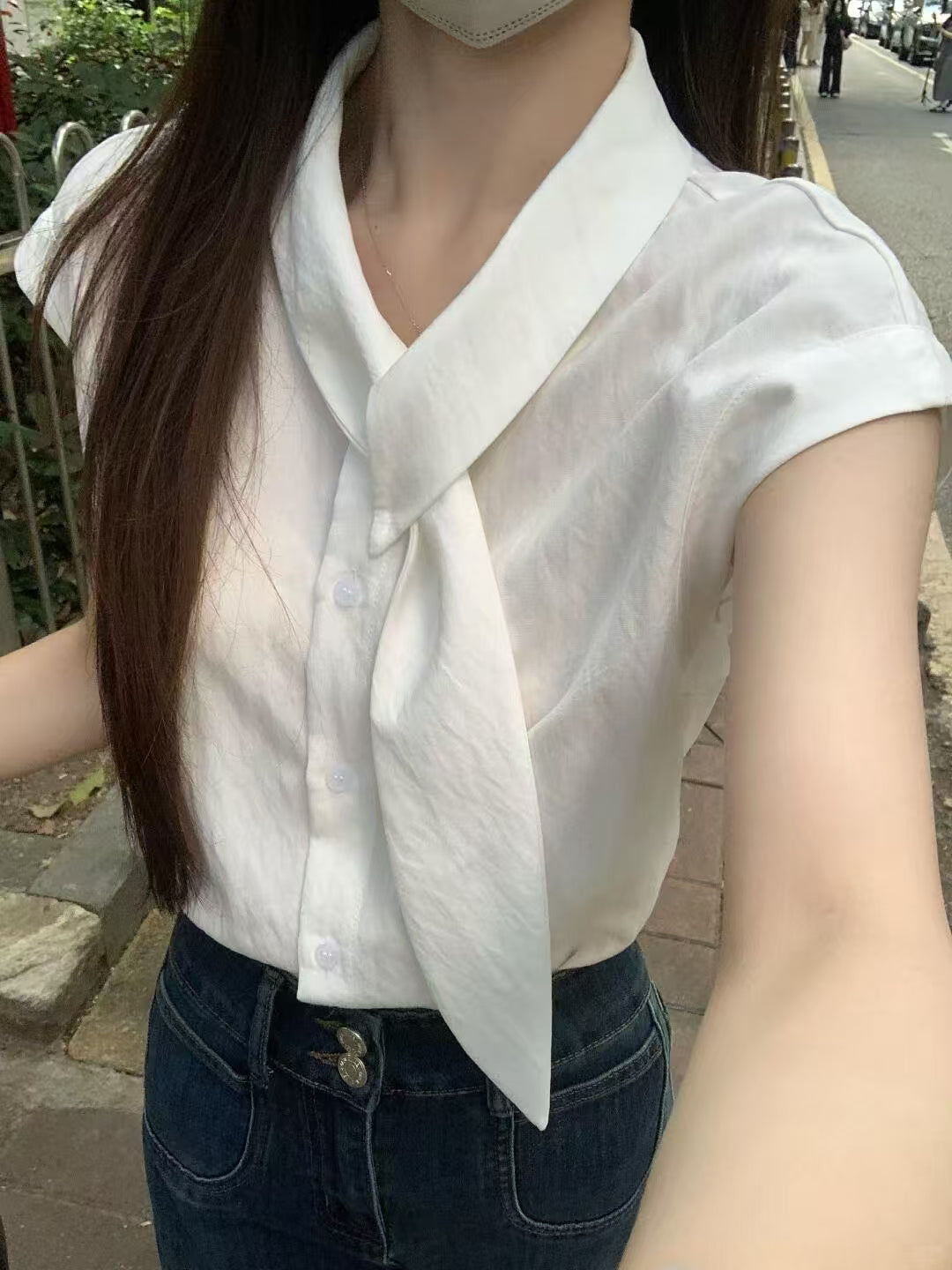 French bow-tie collar white blouse - close up neckline detail