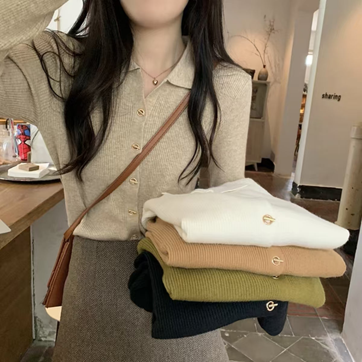 Khaki polo collar knit cardigan - model carrying laptop in cafe